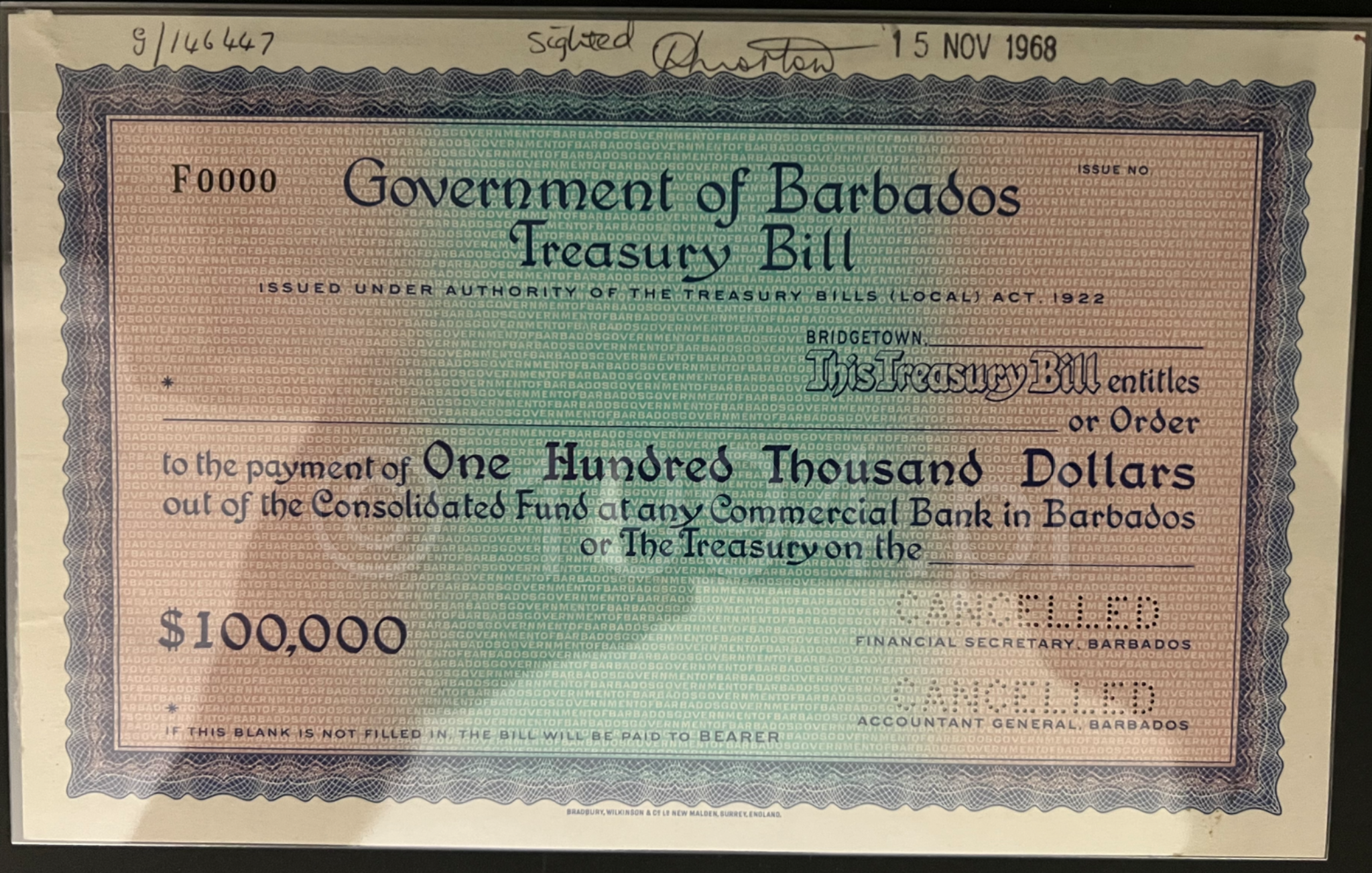 Barbados 1968 Government of Barbados 100,000 Dollars Treasury Bill specimen with prefix F0000 and double perforated CANCELLED cancellation in the lower right corner