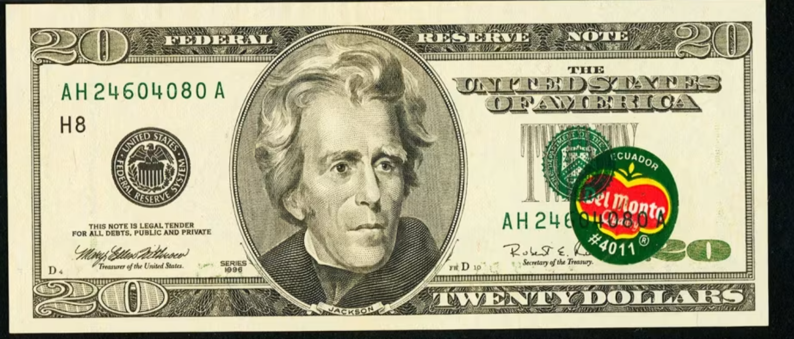 Series 1996 twenty-dollar bill known as the Del Monte error note, showing a banana sticker printed under the green Treasury seal